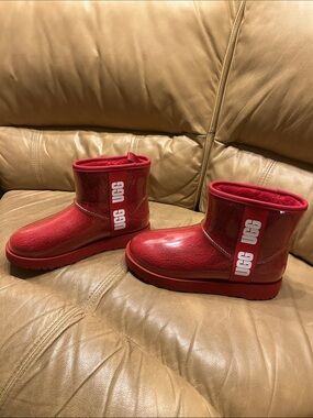 UGG women’s 8 Red Ankle Boots with Branded Side Stripe and clear plastic